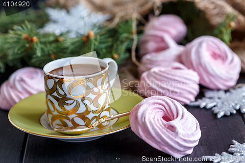 Image of Homemade marshmallows and black coffee.