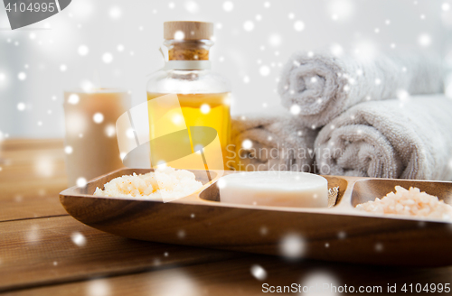 Image of soap, himalayan salt, massage oil and body scrub