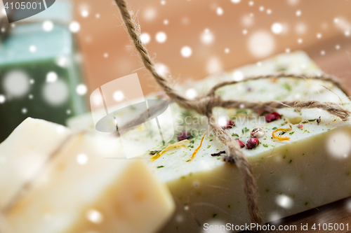 Image of close up of handmade soap bars on wood