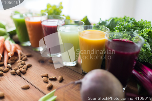 Image of glasses with different fruit or vegetable juices