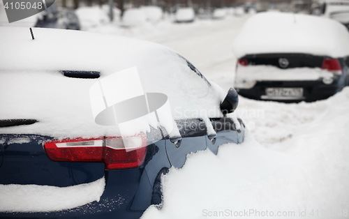 Image of car covered with snow