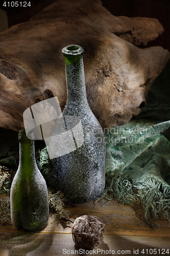 Image of Green Bottles And Wood