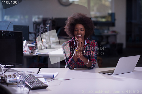 Image of portrait of a young successful African-American woman in modern 