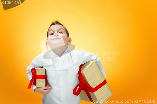 Image of The boy with gift box