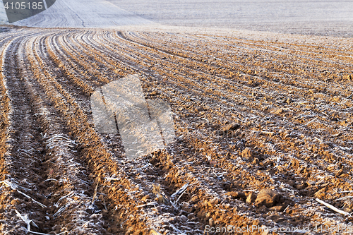 Image of plowed land, frost