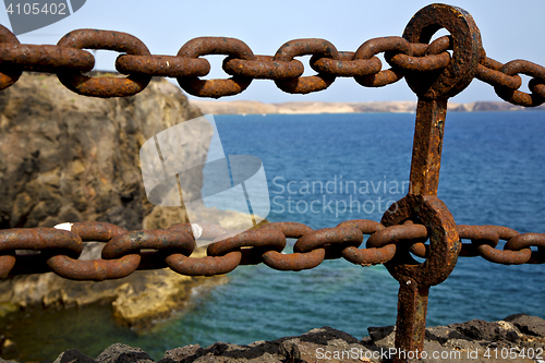 Image of chain  water  boat yacht coastline and summer in lanzarote spain