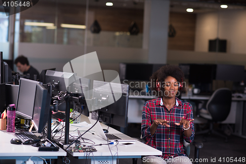 Image of portrait of a young successful African-American woman in modern 