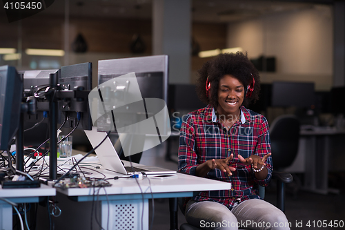 Image of portrait of a young successful African-American woman in modern 