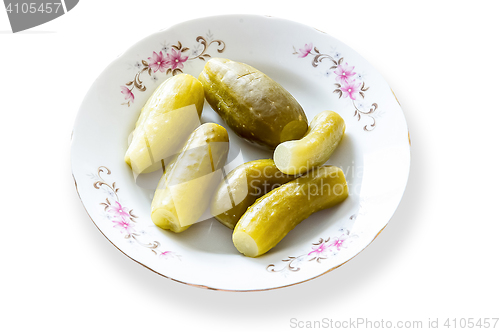 Image of Pickled cucumber in white plate isolated on background wjit clipping mask