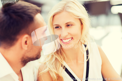 Image of happy couple faces at restaurant