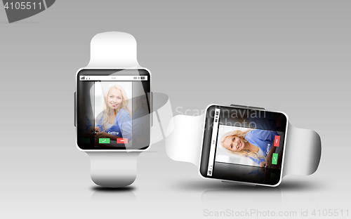 Image of smart watches with incoming call on screen