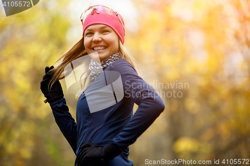 Image of Happy girl in sport clothes