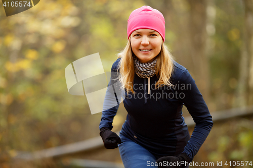 Image of Girl in cap ready run