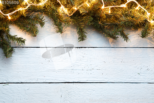 Image of Wooden background with spruce branches for Christmas New Year holidays