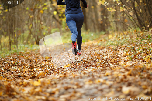 Image of Sportswoman sneakers running autumn