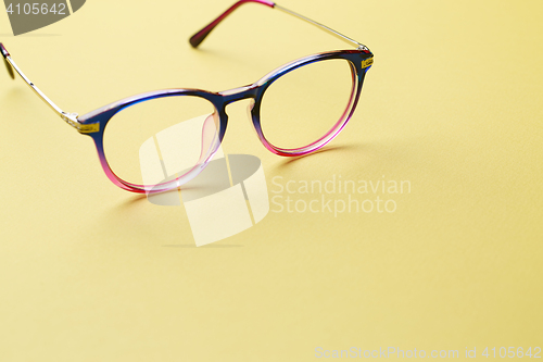 Image of Multi-colored glasses on empty space