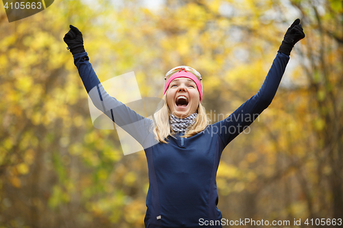 Image of Girl background of autumn landscape
