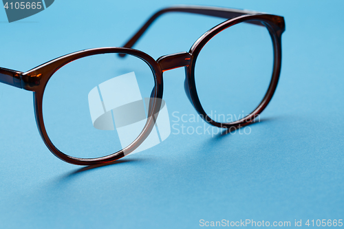 Image of Glasses close-up on blue background