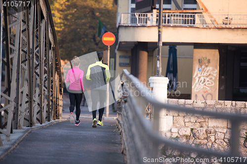 Image of young  couple jogging