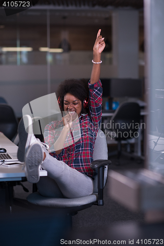 Image of portrait of a young successful African-American woman in modern 