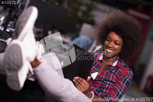 Image of portrait of a young successful African-American woman in modern 