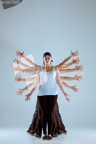 Image of Group of men and women dancing hip hop choreography