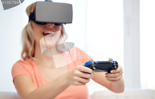 Image of woman in virtual reality headset with controller