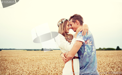 Image of happy smiling young hippie couple outdoors