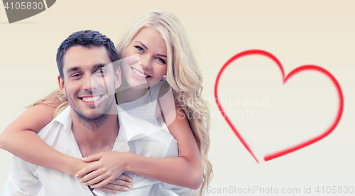 Image of happy couple having fun over beige background