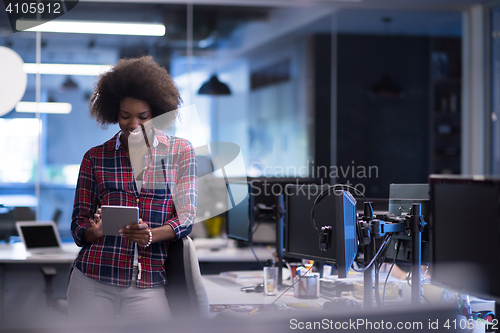 Image of portrait of a young successful African-American woman in modern 