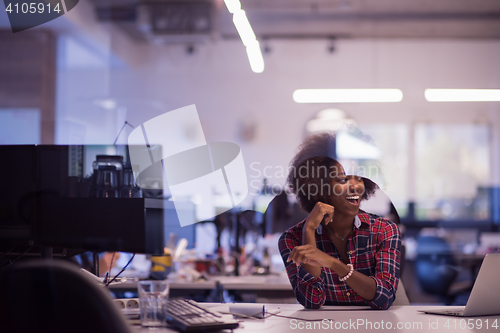 Image of portrait of a young successful African-American woman in modern 