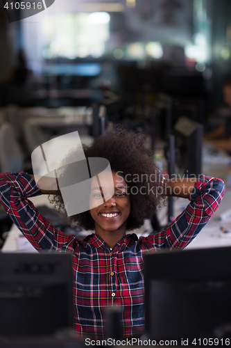 Image of portrait of a young successful African-American woman in modern 