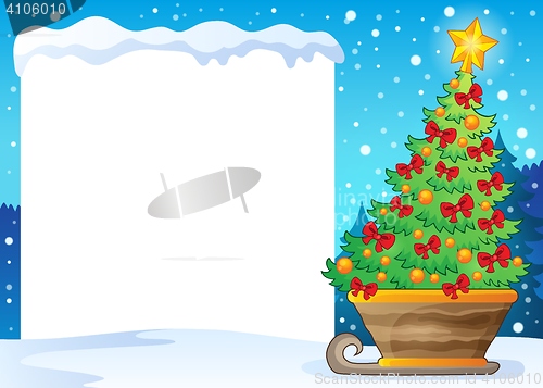 Image of Snowy frame and Christmas tree on sledge