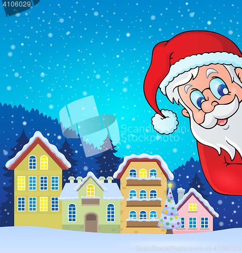 Image of Winter village with lurking Santa Claus