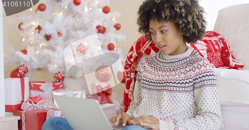 Image of Excited young woman making a surprise find