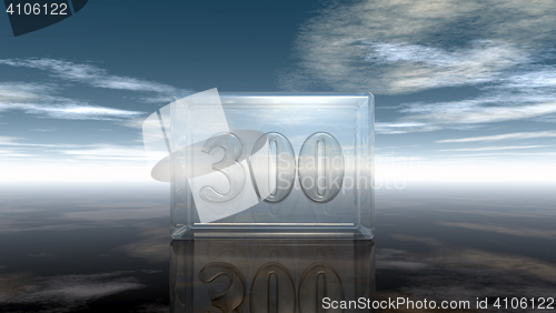 Image of number three hundred in glass cube under cloudy sky - 3d rendering