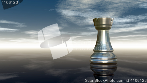 Image of metal chess rook under cloudy sky - 3d rendering