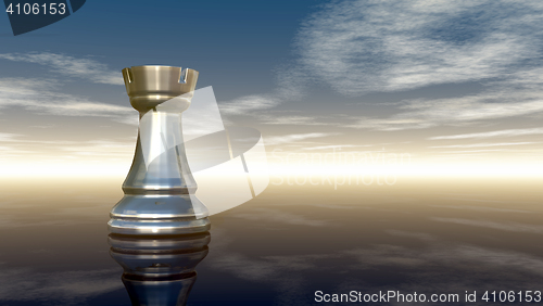 Image of metal chess rook under cloudy sky - 3d rendering