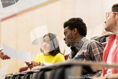 Image of international students with test on lecture