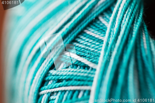 Image of close up of turquoise knitting yarn ball