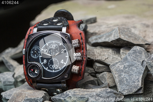 Image of watches with several dials and leather bracelet