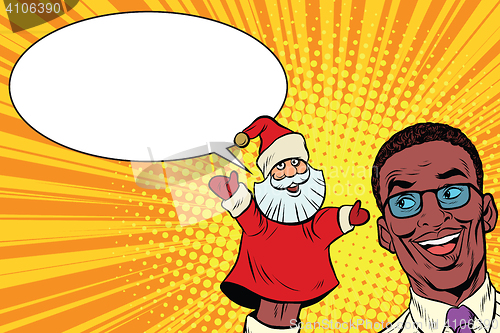 Image of African businessman with hand puppet Santa Claus