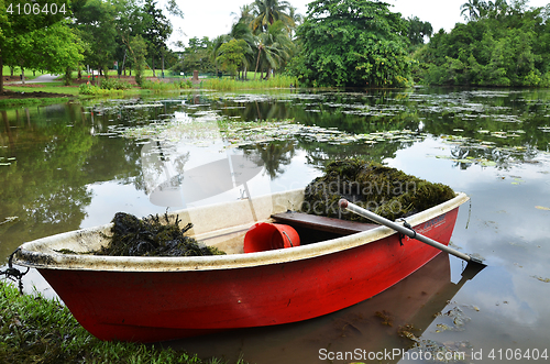 Image of Red boat in Singapore Botanic Garden