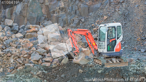 Image of Small orange bulldozer