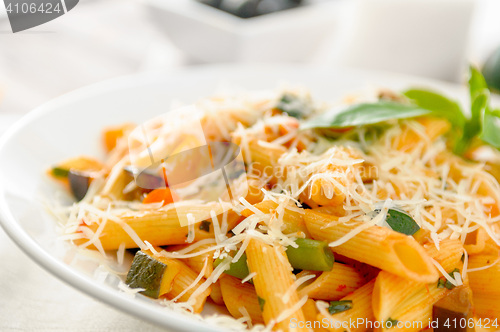 Image of pasta whith vegetables on the plate