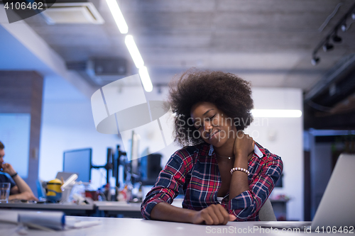Image of portrait of a young successful African-American woman in modern 