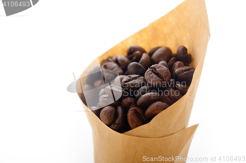 Image of espresso coffee beans on a paper cone