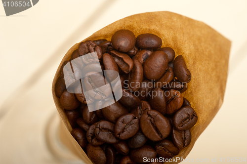 Image of espresso coffee beans on a paper cone