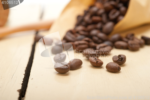 Image of espresso coffee beans on a paper cone