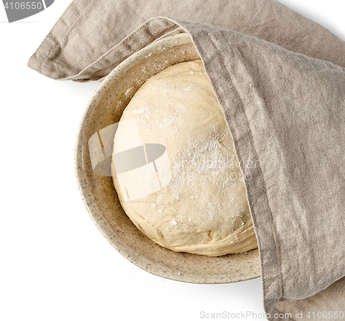 Image of bowl of dough and linen towel